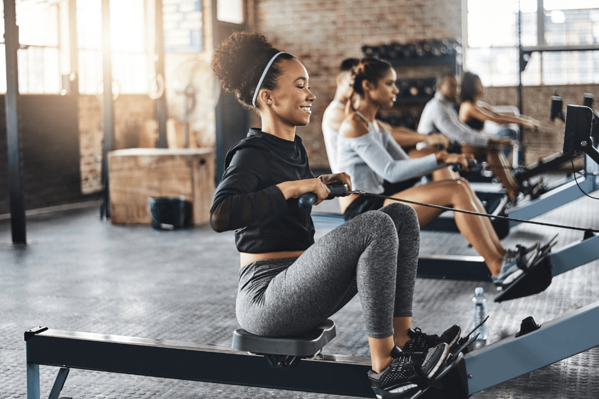 Gym owner reviewing lead capture data and marketing strategy plan
