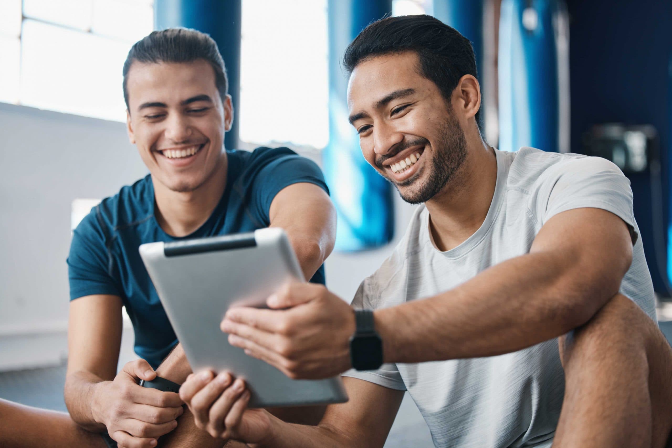 Martial arts school owner using martial arts membership billing software to manage family accounts and student payments