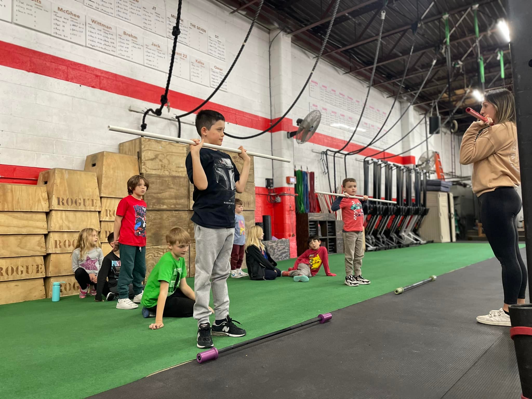 Personal trainer managing client schedules using Zen Planner software