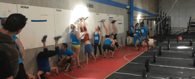 blue shirt handstands