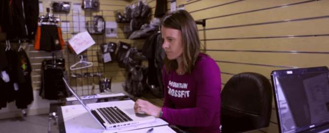 woman sitting at laptop