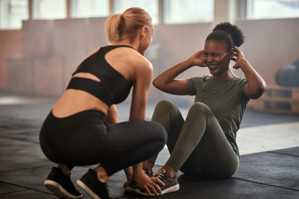 Gym owner welcoming new prospect during a consultation session