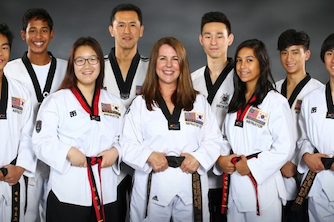 White Tiger Martial Arts class photo with Grand Master Yoo and Mrs. Yoo