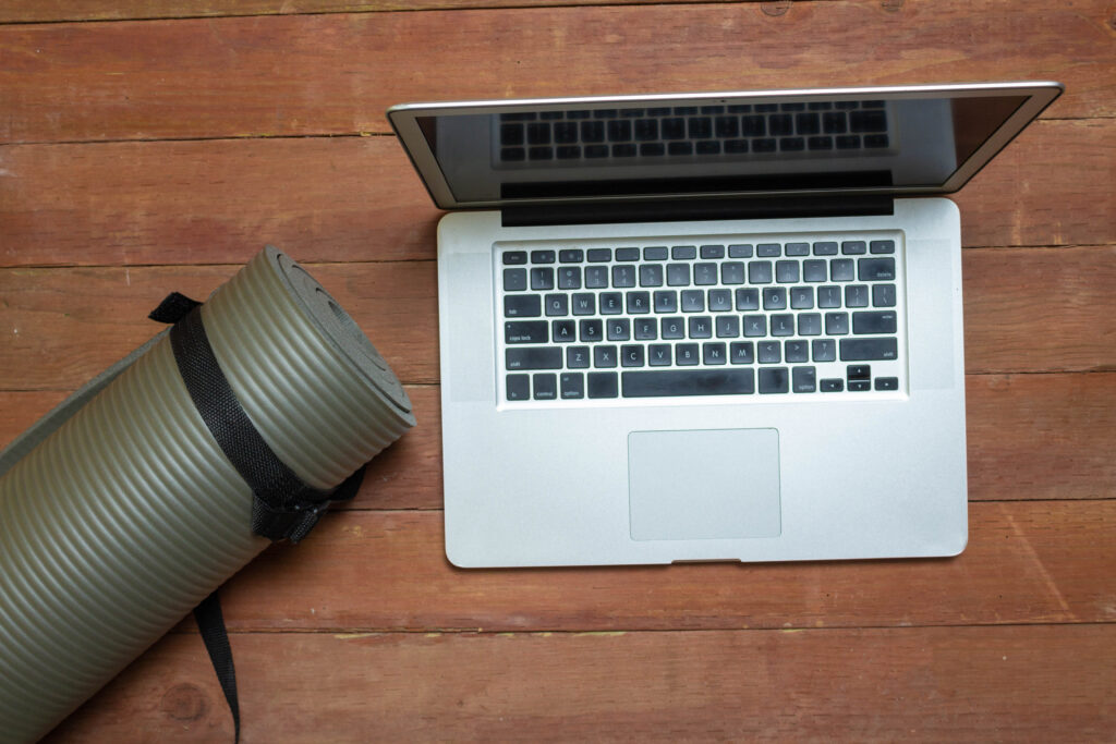 Yoga mat and a laptop