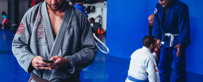 Gym owner reviewing lead growth and CRM marketing campaign results