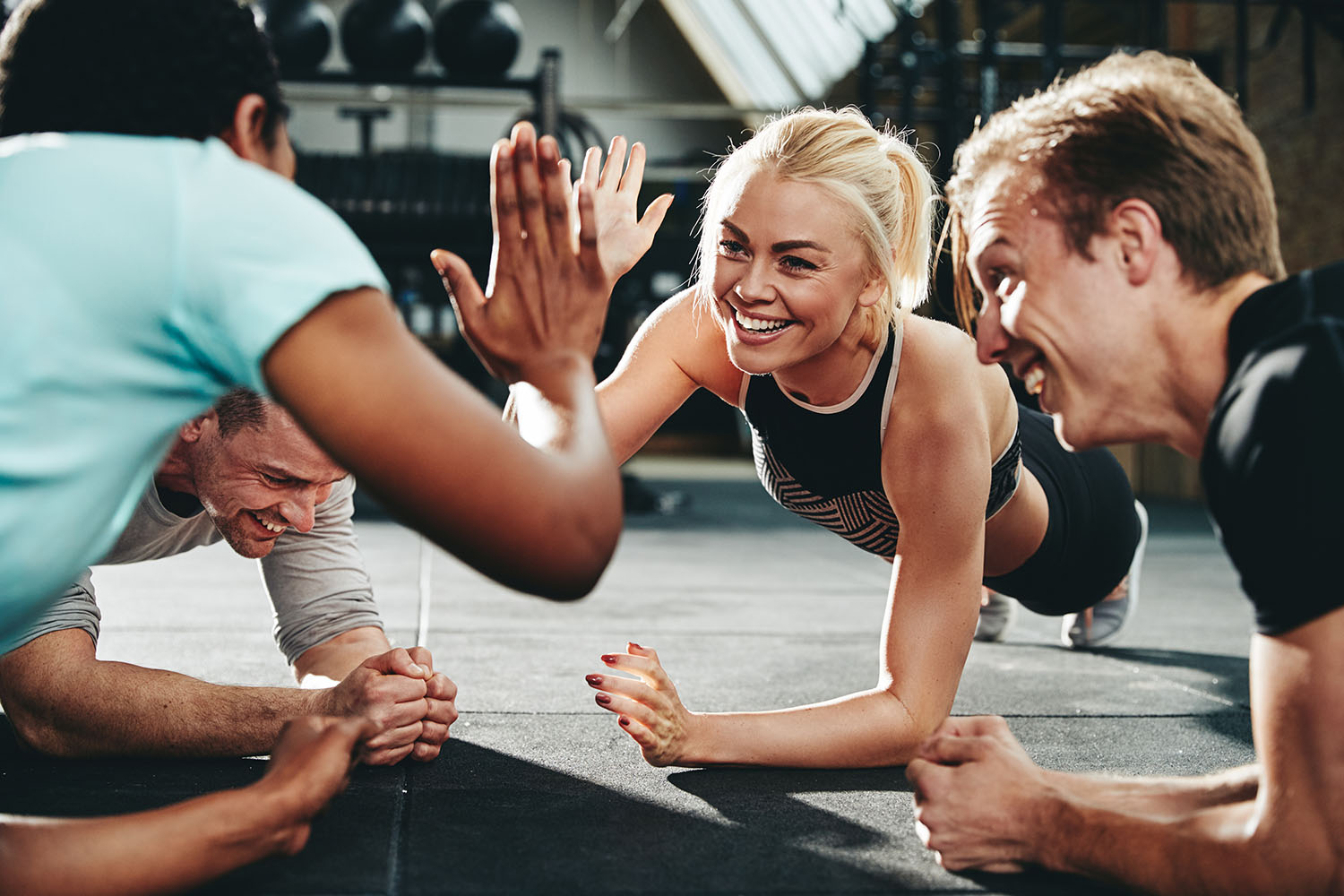 New gym owner reviewing Zen Planner setup checklist on tablet during studio launch