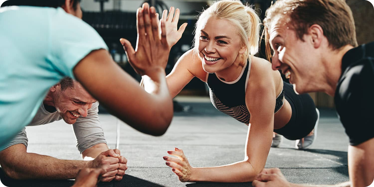 Fitness gym members working out.