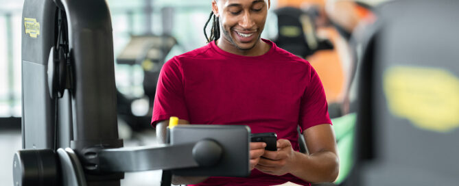 Hybrid fitness studio owner managing schedules and payments through Zen Planner’s all-in-one gym software.
