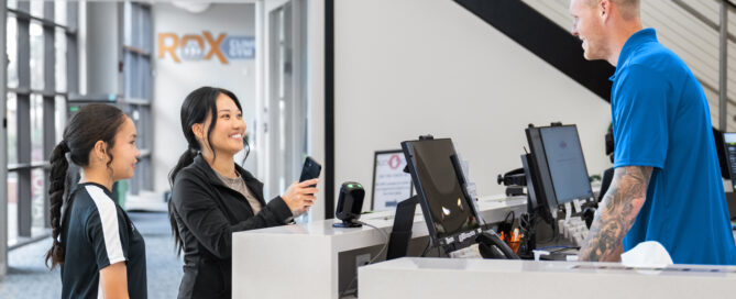 Gym owner using Zen Planner billing dashboard to automate payments