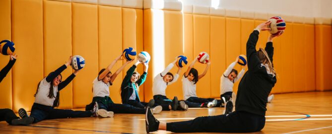 Gym owner leading a fitness class using community-focused gym software