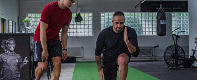 Gym owner reviewing gym management software dashboard