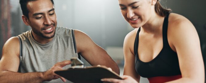 Gym owner coaching while Workflow AI handles admin tasks