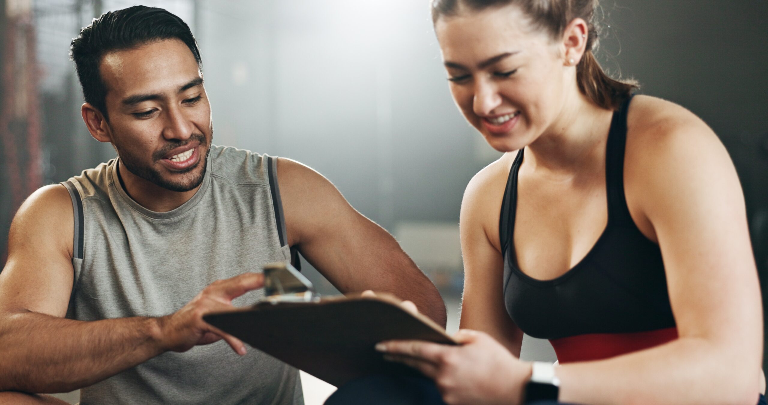 Gym owner coaching while Workflow AI handles admin tasks