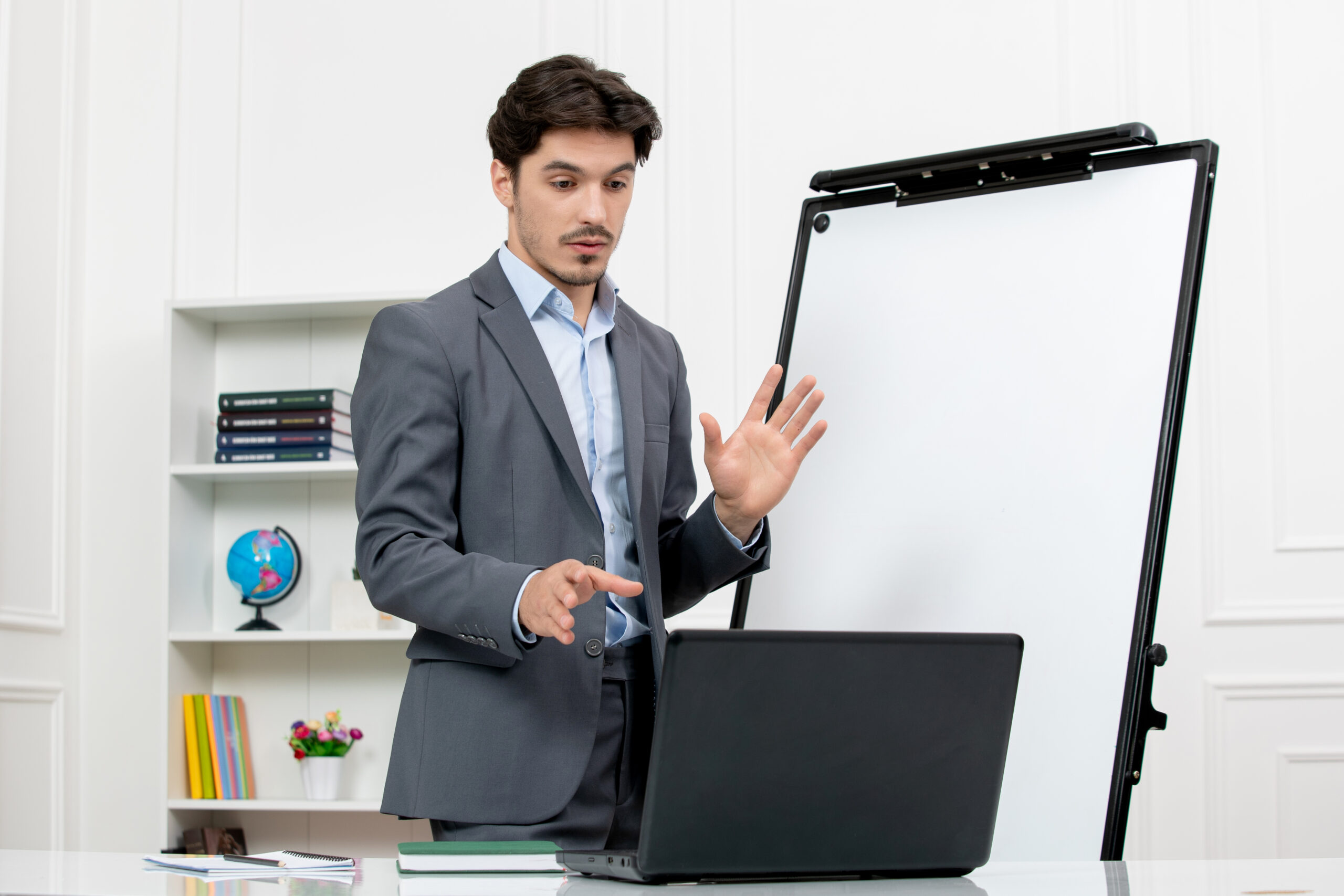An Instructor Sharing a Promotion Report Through a Martial Arts Software