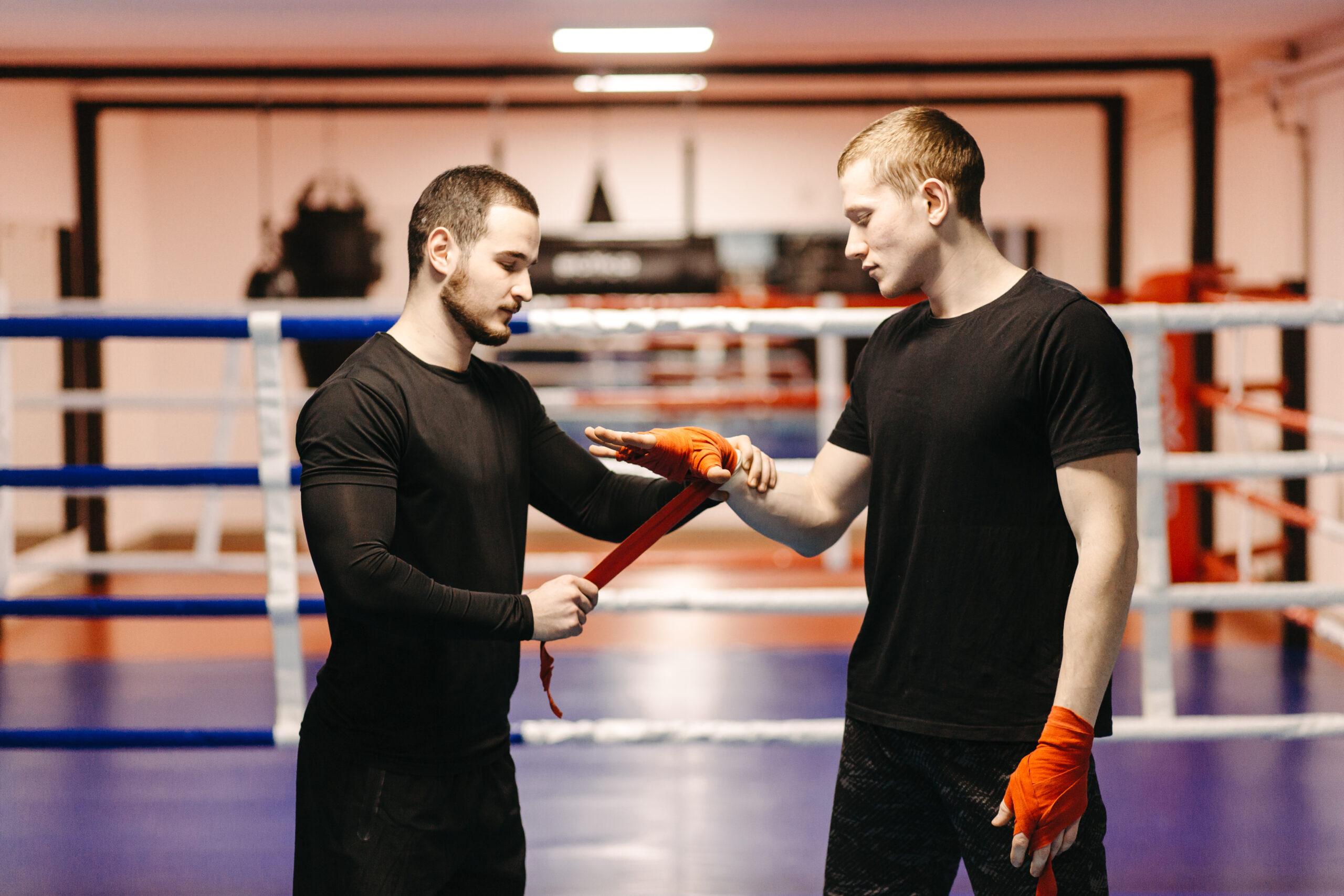Boxers Preparing for Training in a Gym