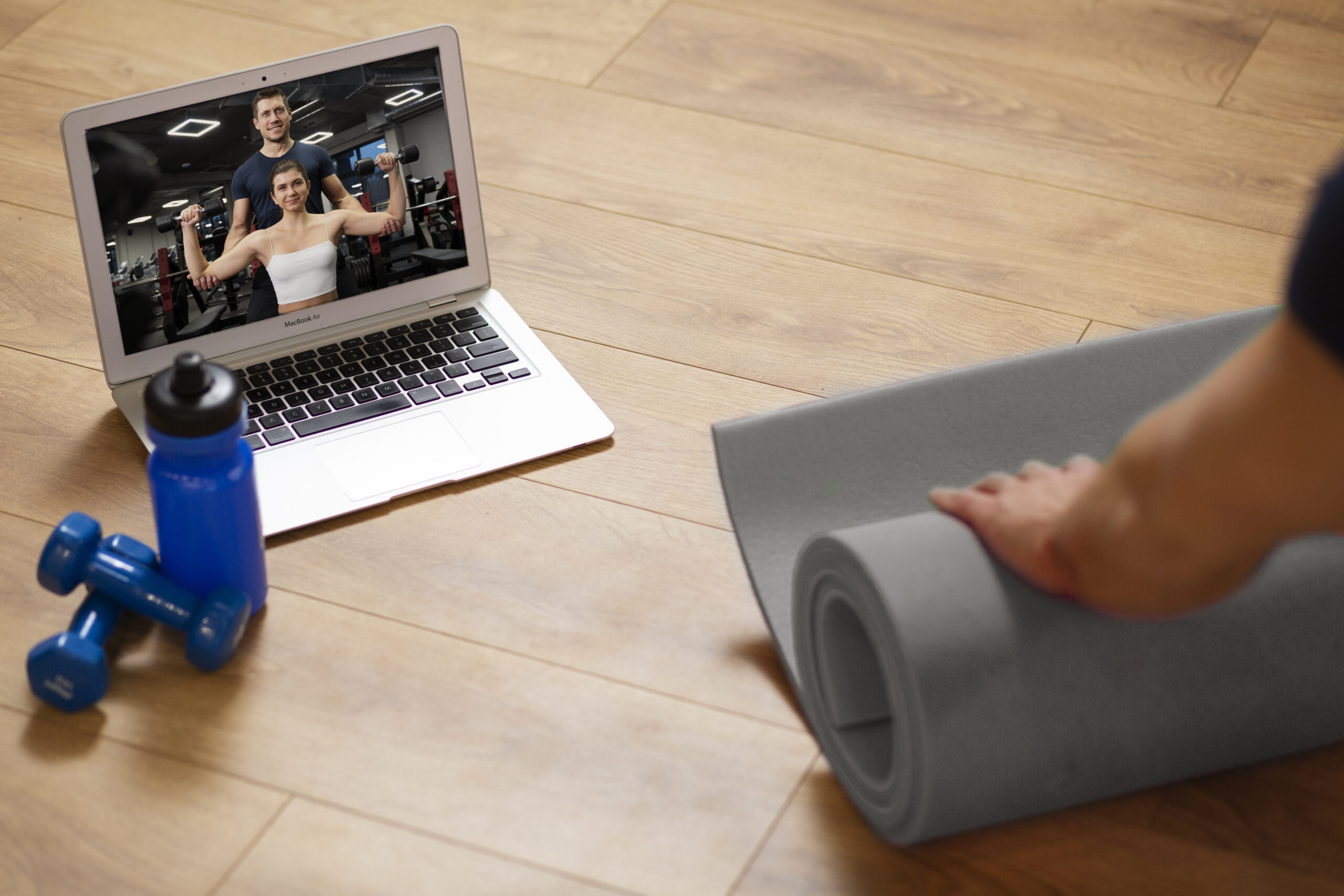 A Gym Trainer Managing Both Virtual and In-person Classes