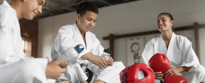 Martial Arts Students Relaxing After the Practice Session