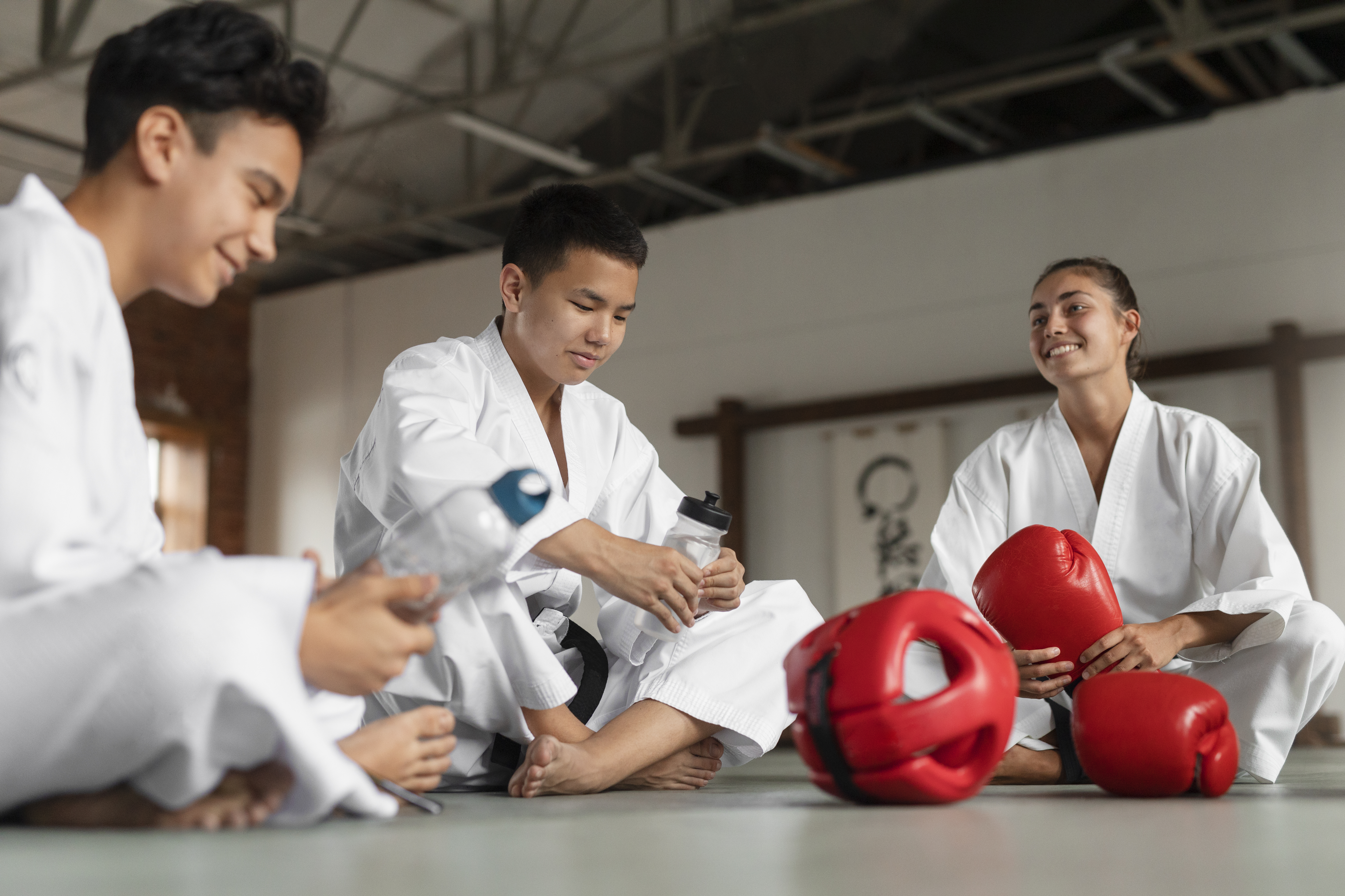 Martial Arts Students Relaxing After the Practice Session