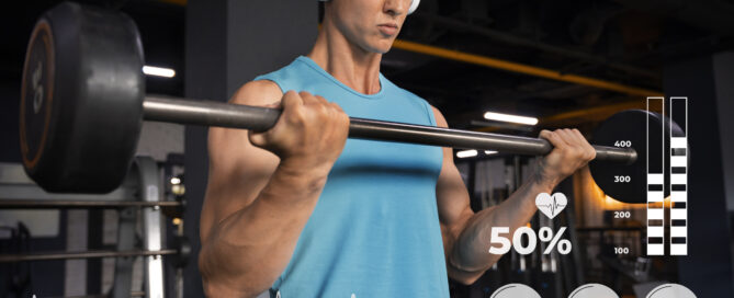 Man tracking workout progress with gym software