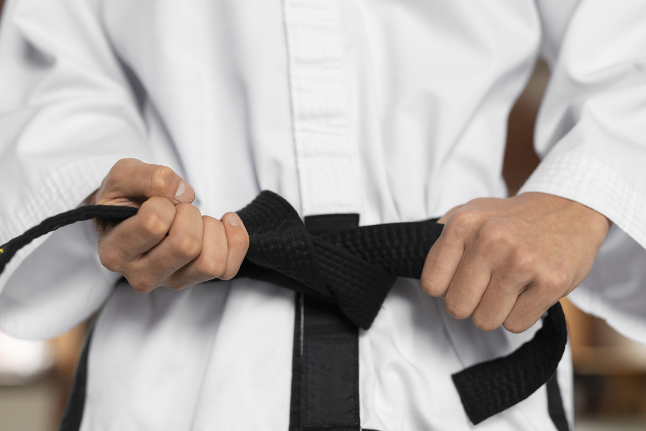 A Martial Arts Student With Black Belt