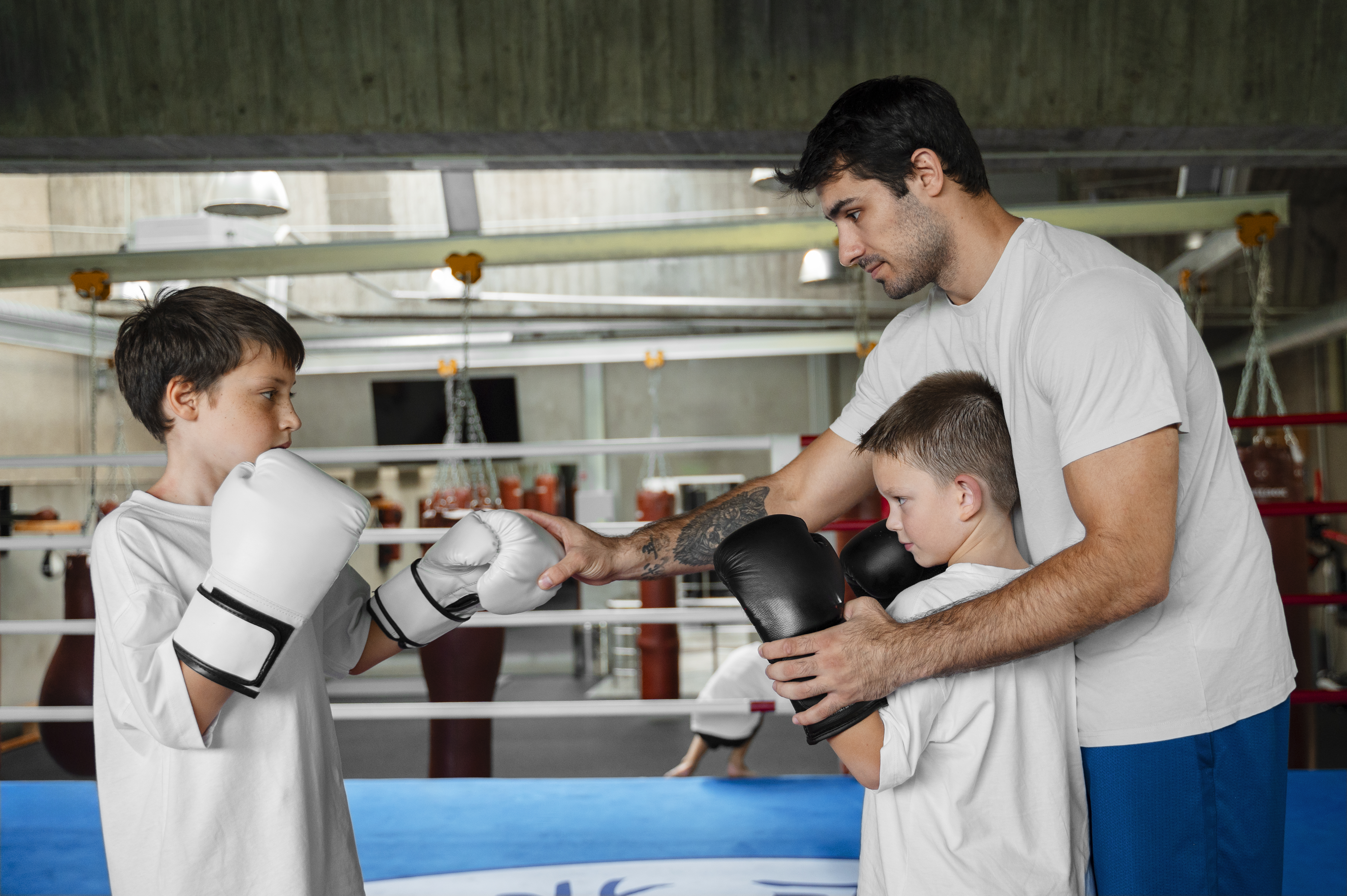 An Instructor Providing Training to Students at a Martial Arts School