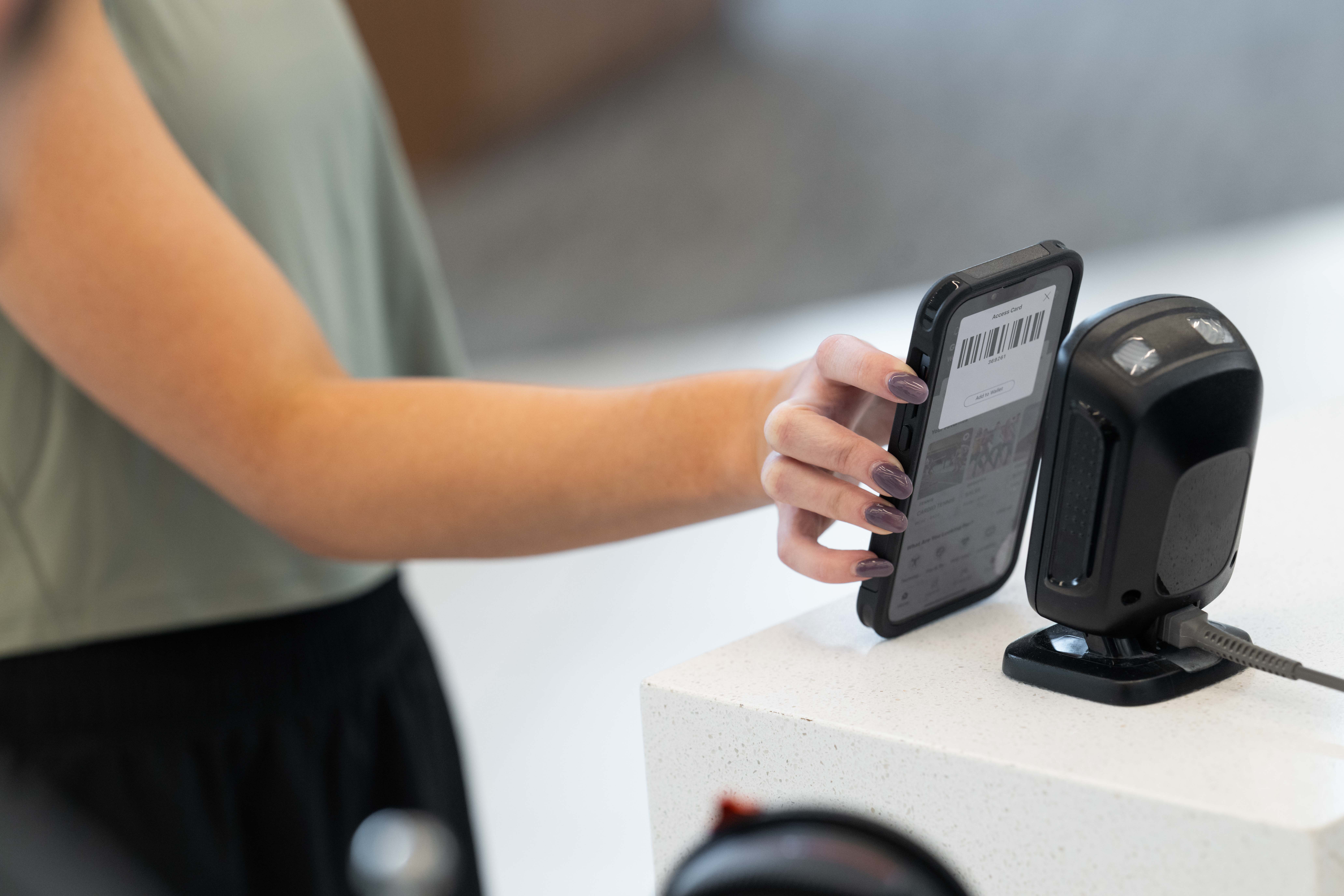 Gym owner managing memberships using Zen Planner's gym membership software