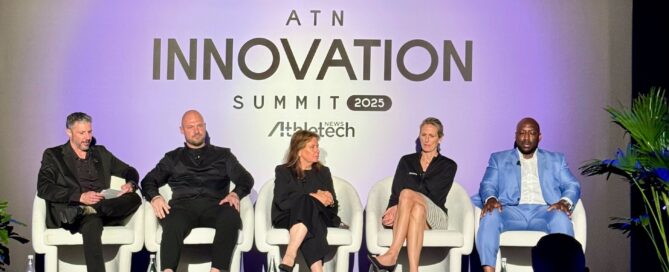 Fitness professionals discussing AI tools at an industry summit
