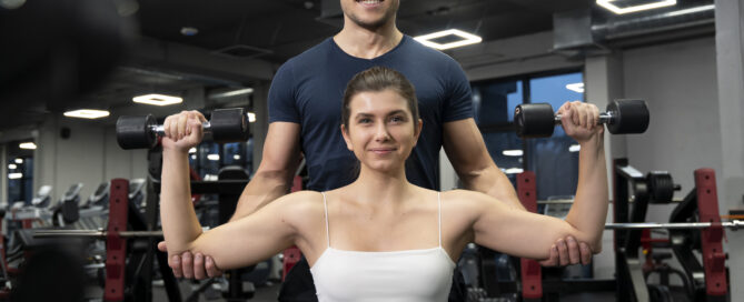 New Fitness Instructor Being Trained and Mentored in the Gym