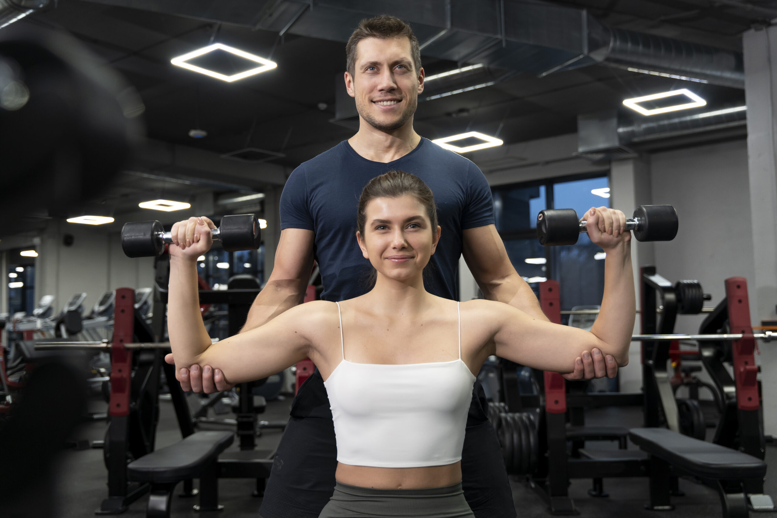 New Fitness Instructor Being Trained and Mentored in the Gym