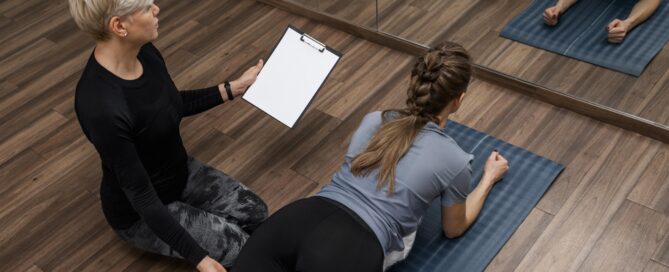 A Trainer Helping Her Student with Balancing