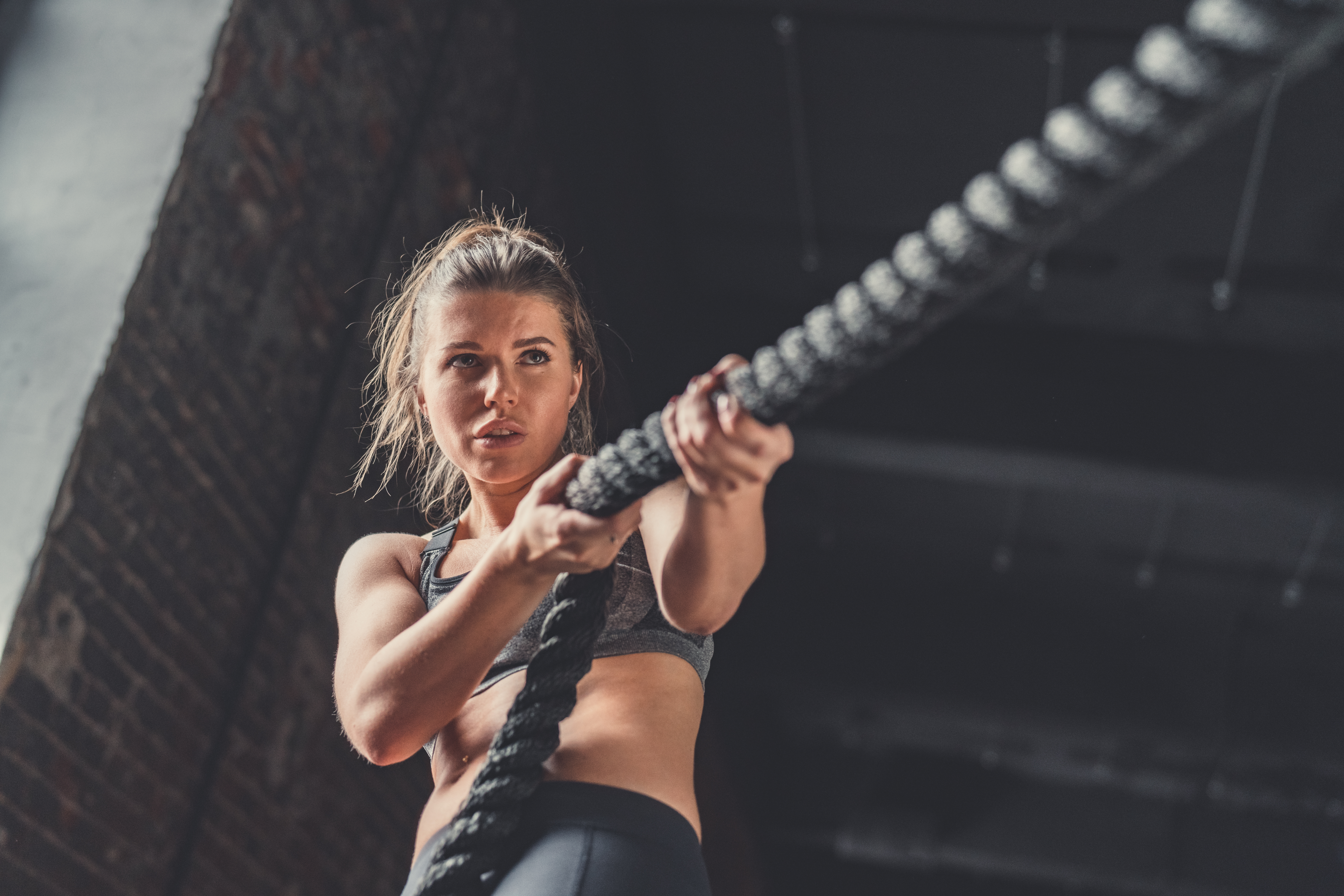 A Fitness Member Interacting With a Trainer