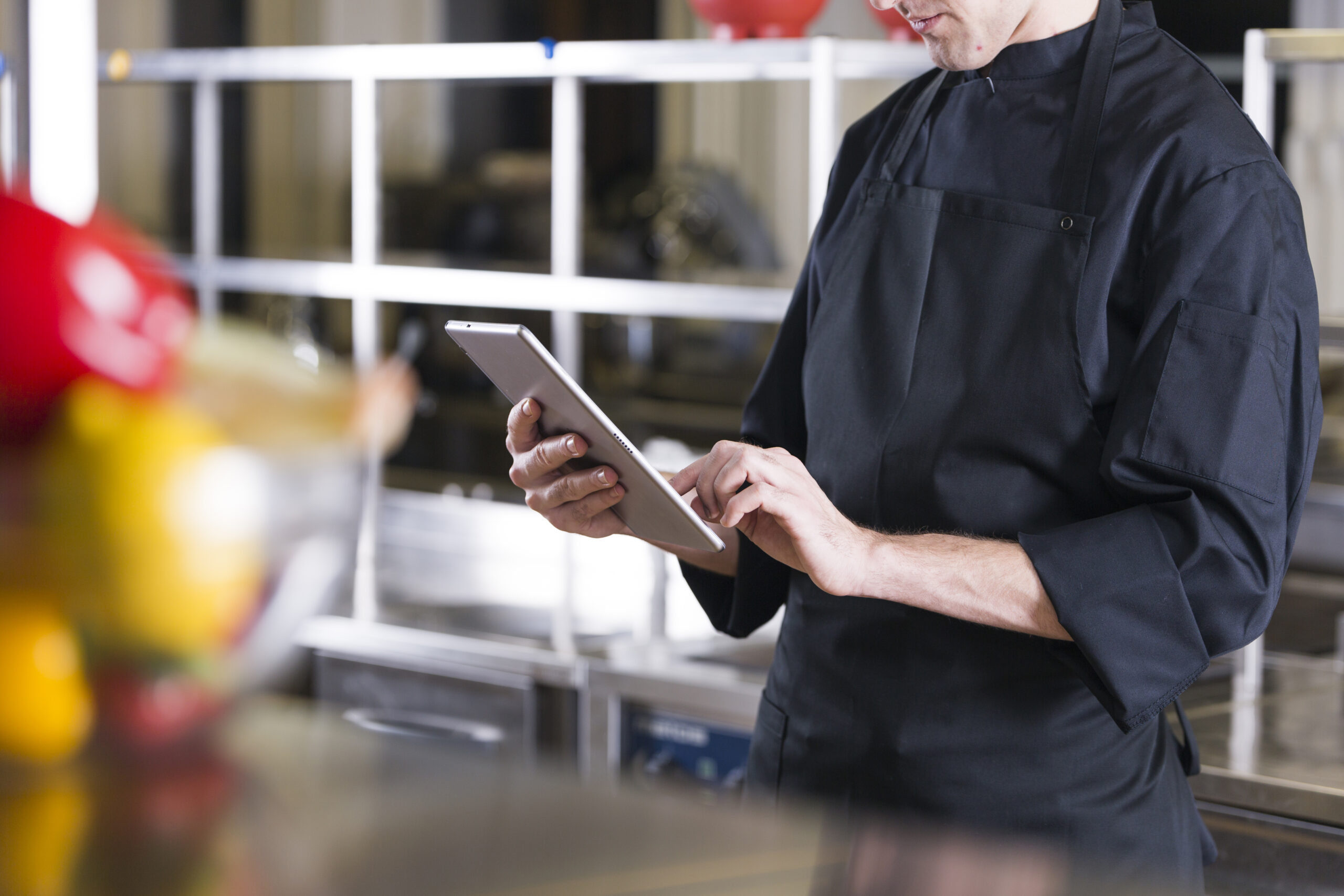 Gym owner checking payment dashboard on software