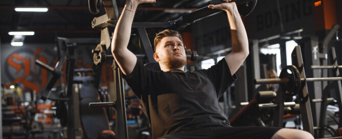 A sportsman exercising in a gym
