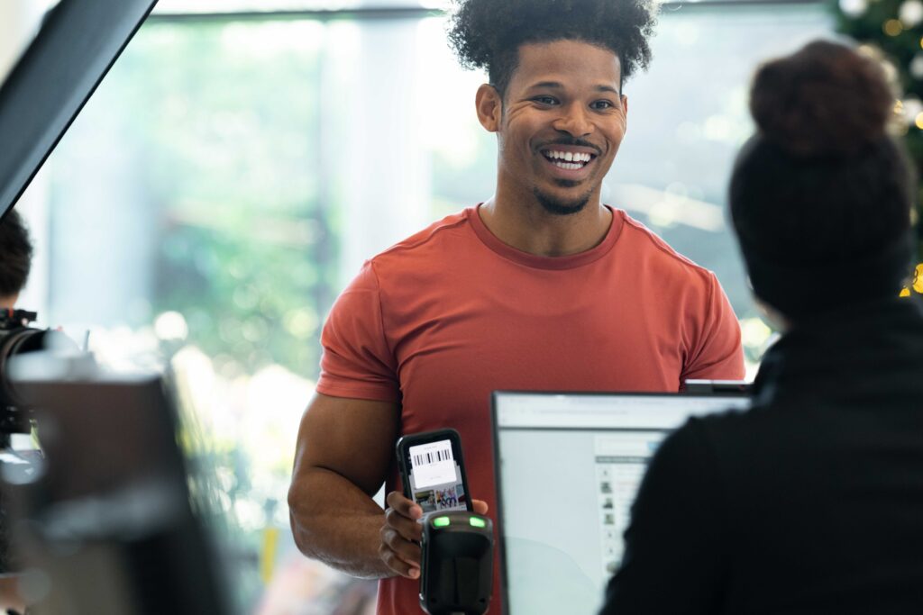 Gym owner using Zen Planner Engage software to communicate with members