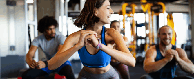 Gym members making the most of AI and automation strategies for fitness business growth.