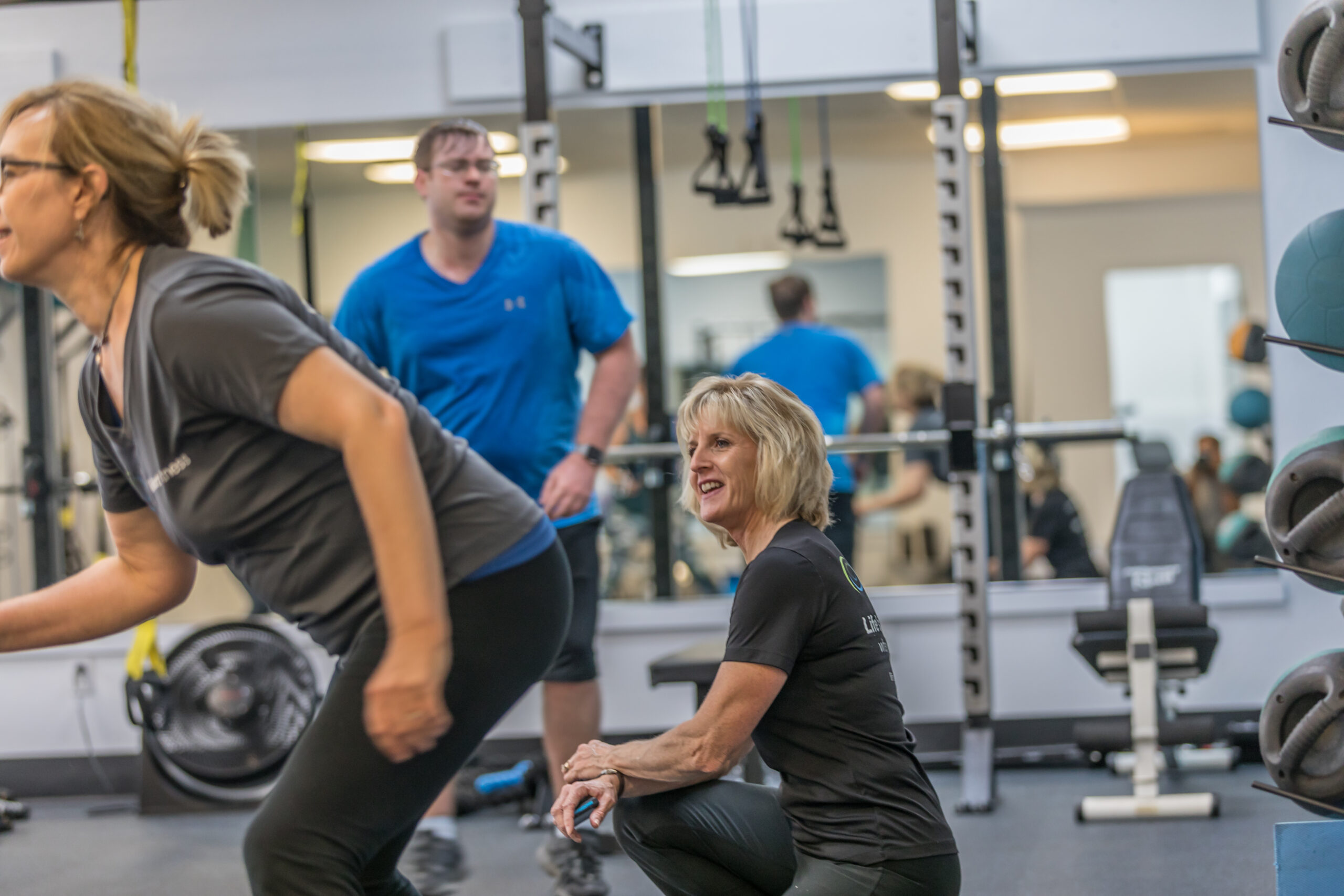 Becky overseeing her members while working out in her semi-private studio.
