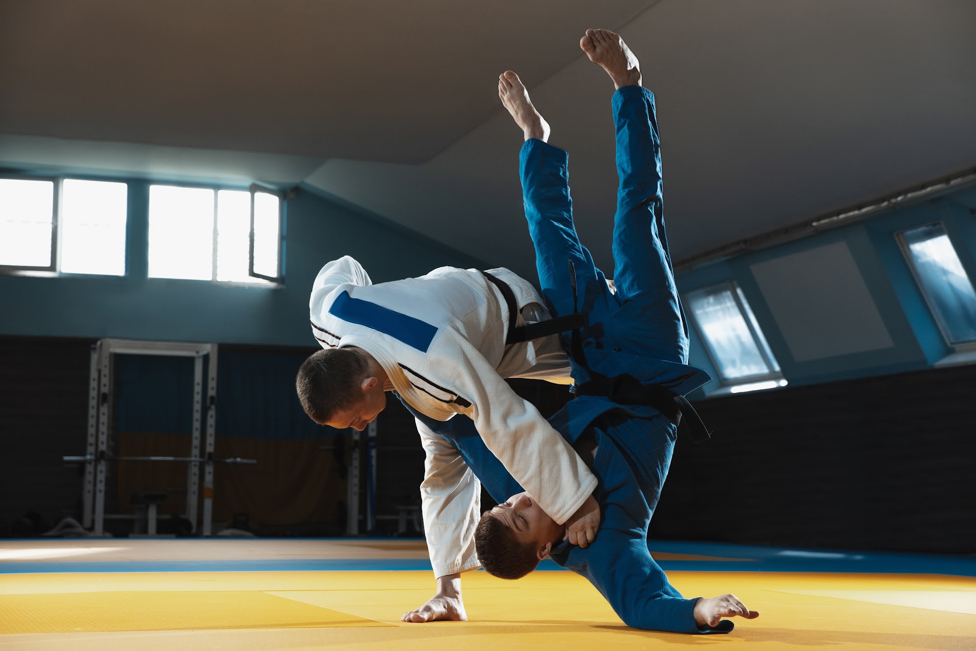 Dojo owner using martial arts management software to organize student promotions