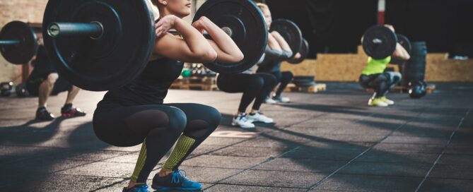Gym owners reviewing performance dashboards inside software for gym owners.