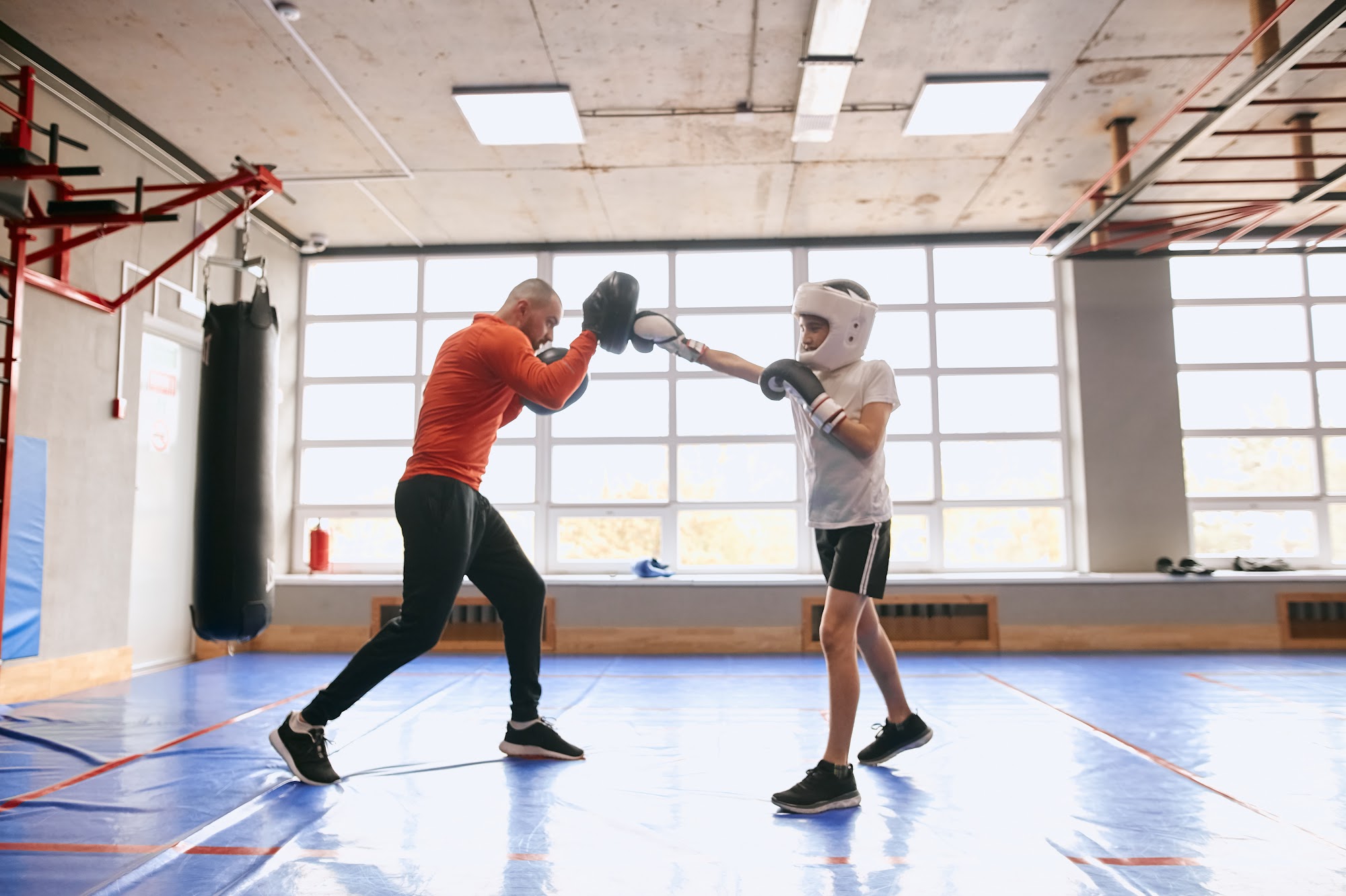 Dojo students training with icons showing automation features