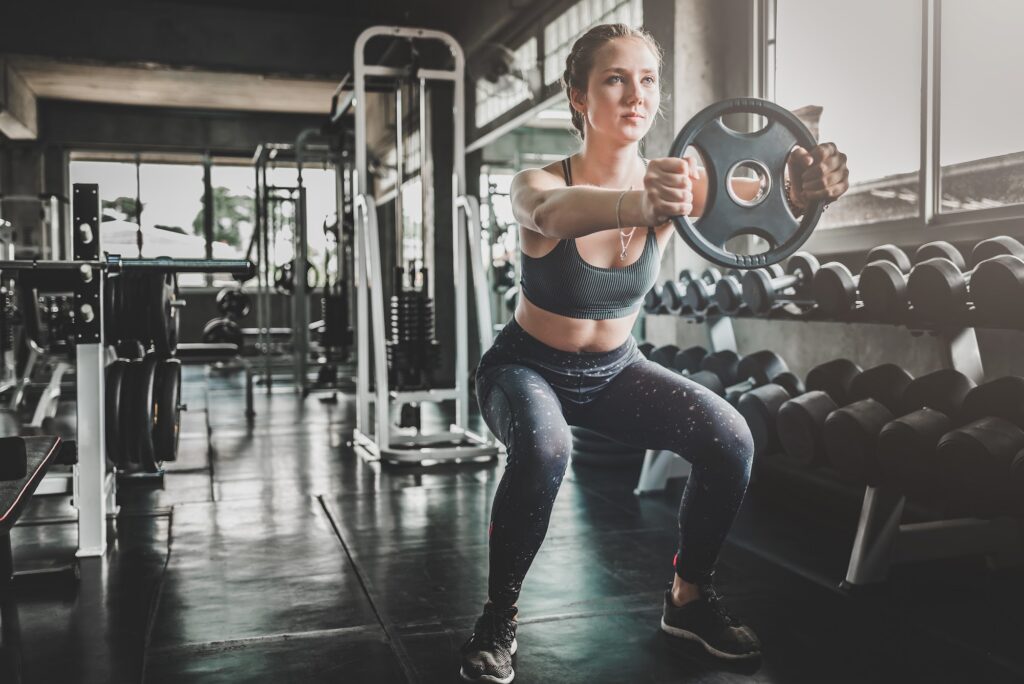 Gym owner using software to manage members efficiently