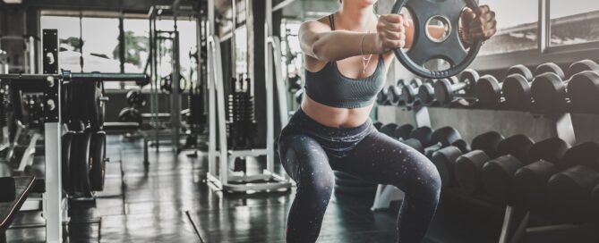 Gym owner using software to manage members efficiently