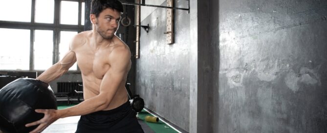 Diverse gym members exercising together, representing improved retention through gym software.