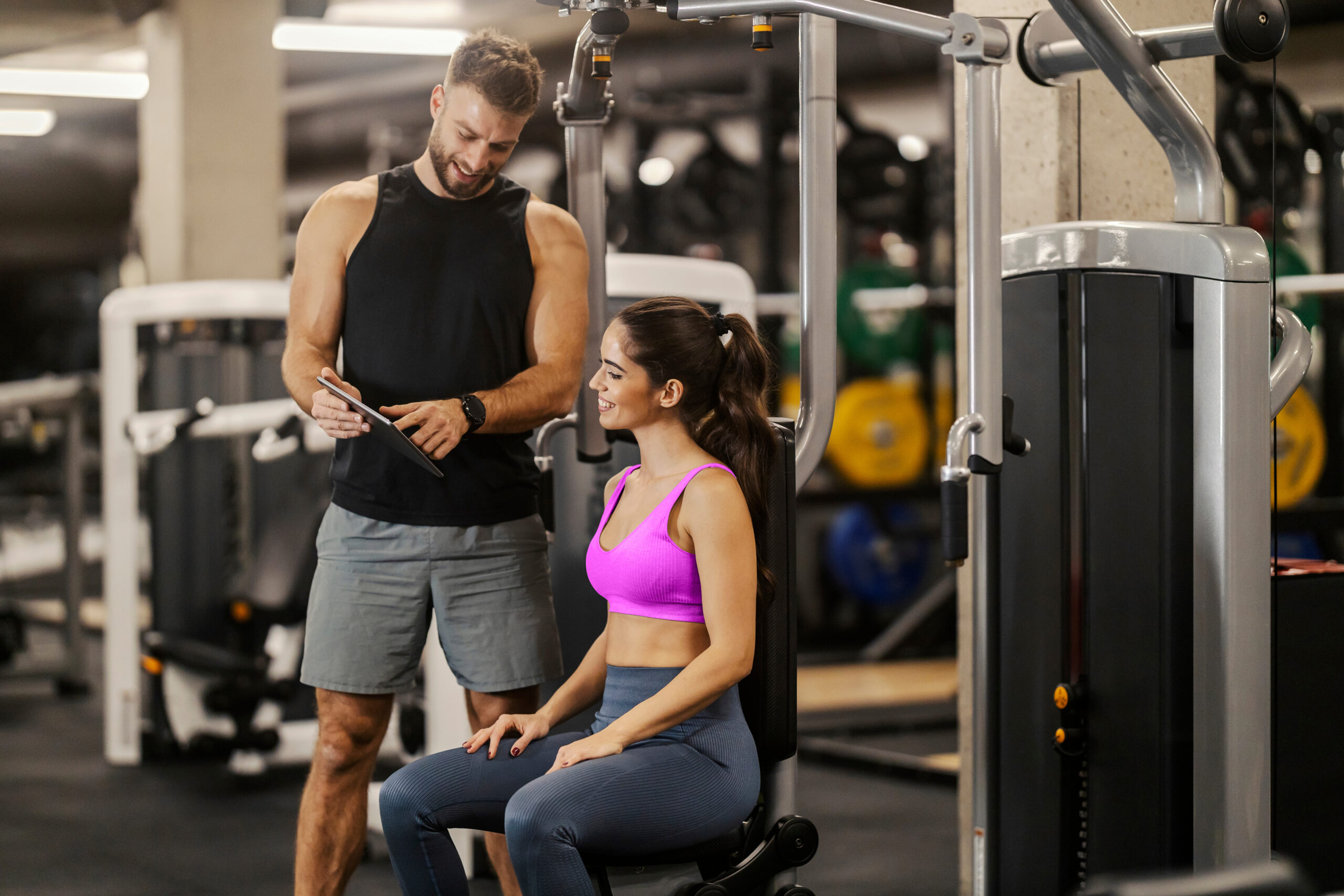Gym owner reviewing gym member retention dashboard and attendance trends on Zen Planner
