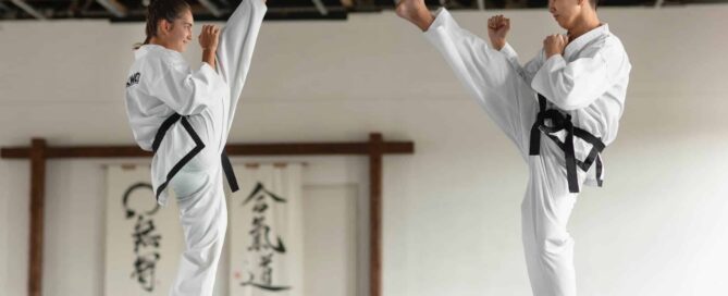 Martial arts instructor reviewing class schedules and student attendance